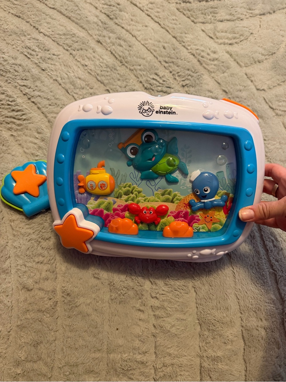Baby Einstein Blue and White Ocean Aquarium Toy with Orange Accents